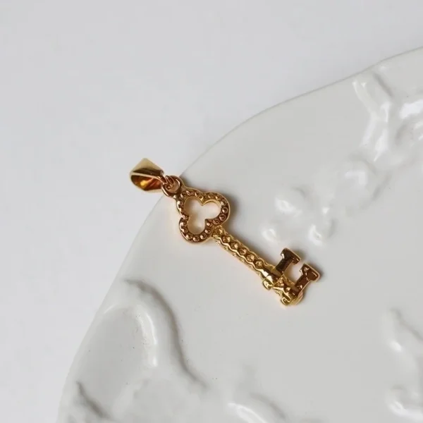 Dije llave 18K